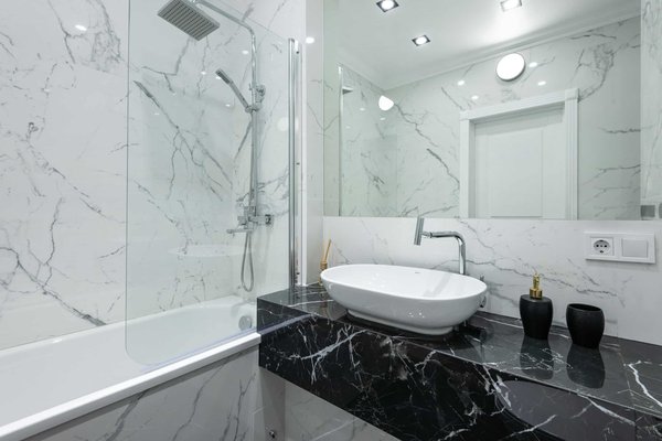 How do you create a luxury spa bathroom in a small space in a Brighton home?